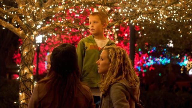 Les yeux écarquillés et éblouis des enfants accompagnés de leurs familles à Temple Square pour voir l'éclairage de Noël.